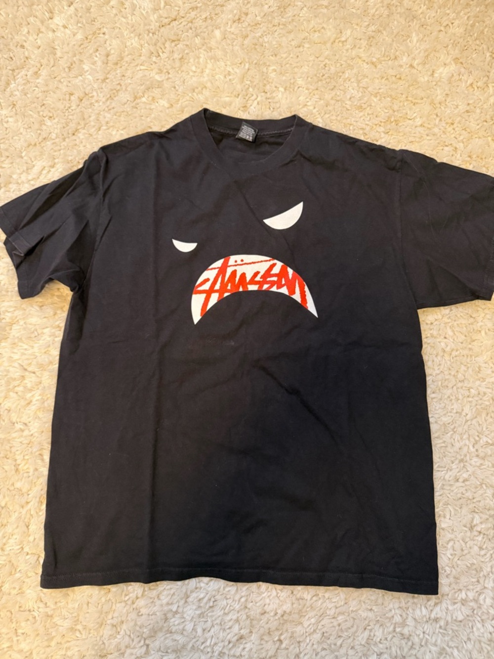 Stussy Black Crewneck Tee with White Logo Tag